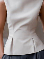 Sleeveless High-Neck Flared Hem Tailored Blouse