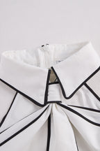 Stylish Sleeveless Halter Neck Blouse With Bold Contrast Trim